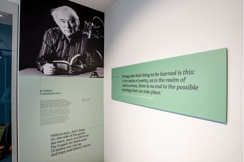 Exhibition showing picture of Heaney along with some text on the wall